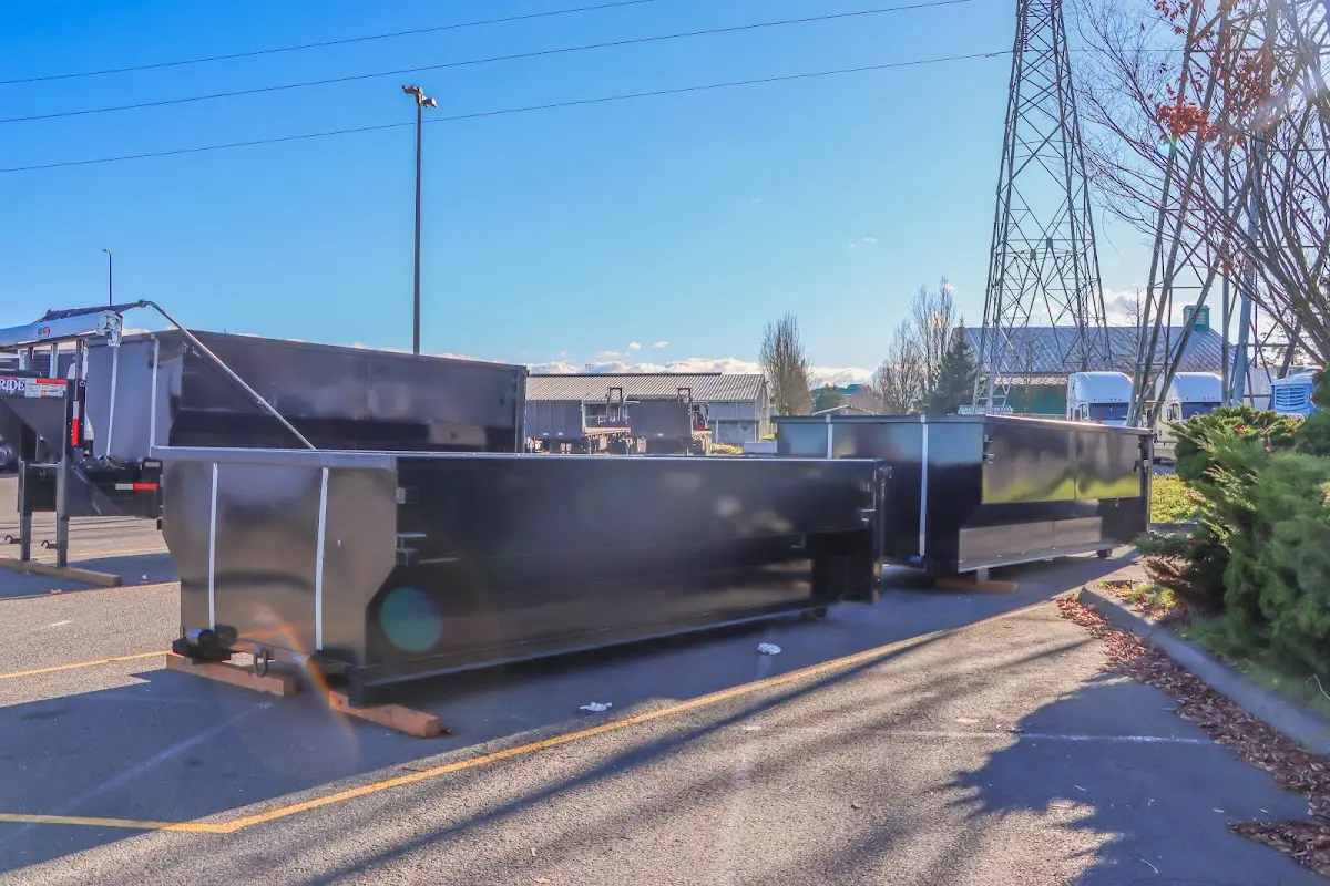 Roll-off dumpster ready for waste disposal at job site for 30 Yard Dumpster Rental in Evans